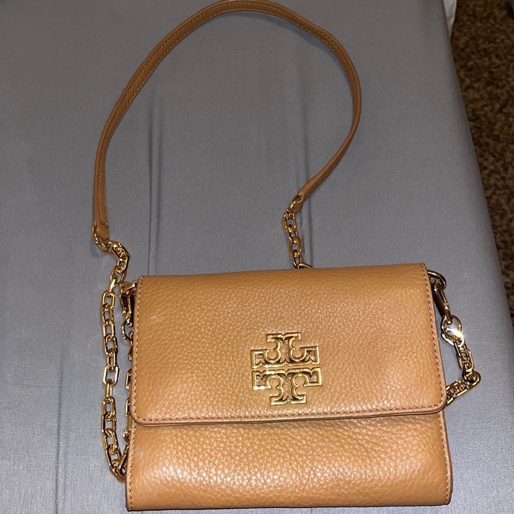 Authentic brown tory butch crossbody purse.